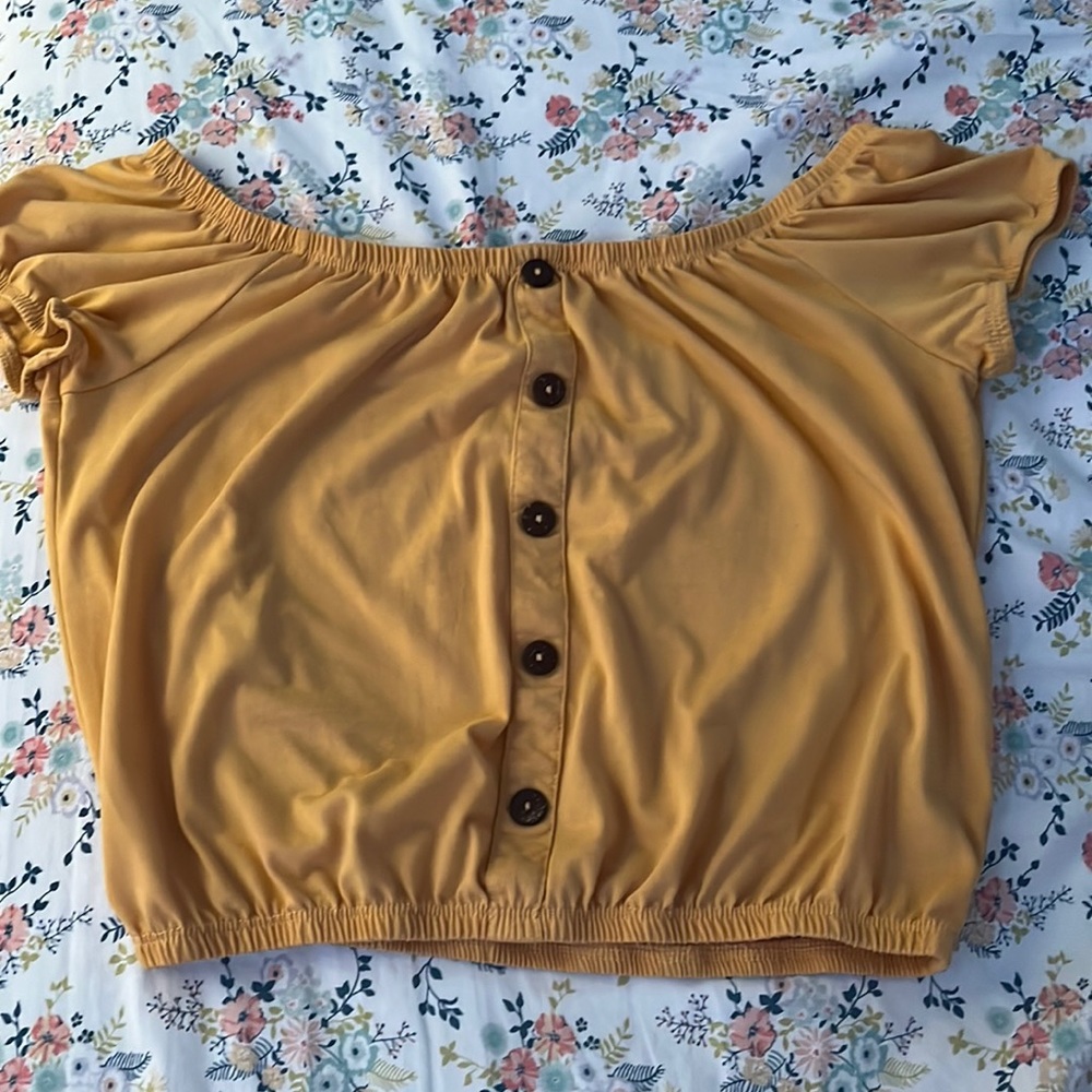 This yellow, crop top is very comfortable and is not to short when worn:)